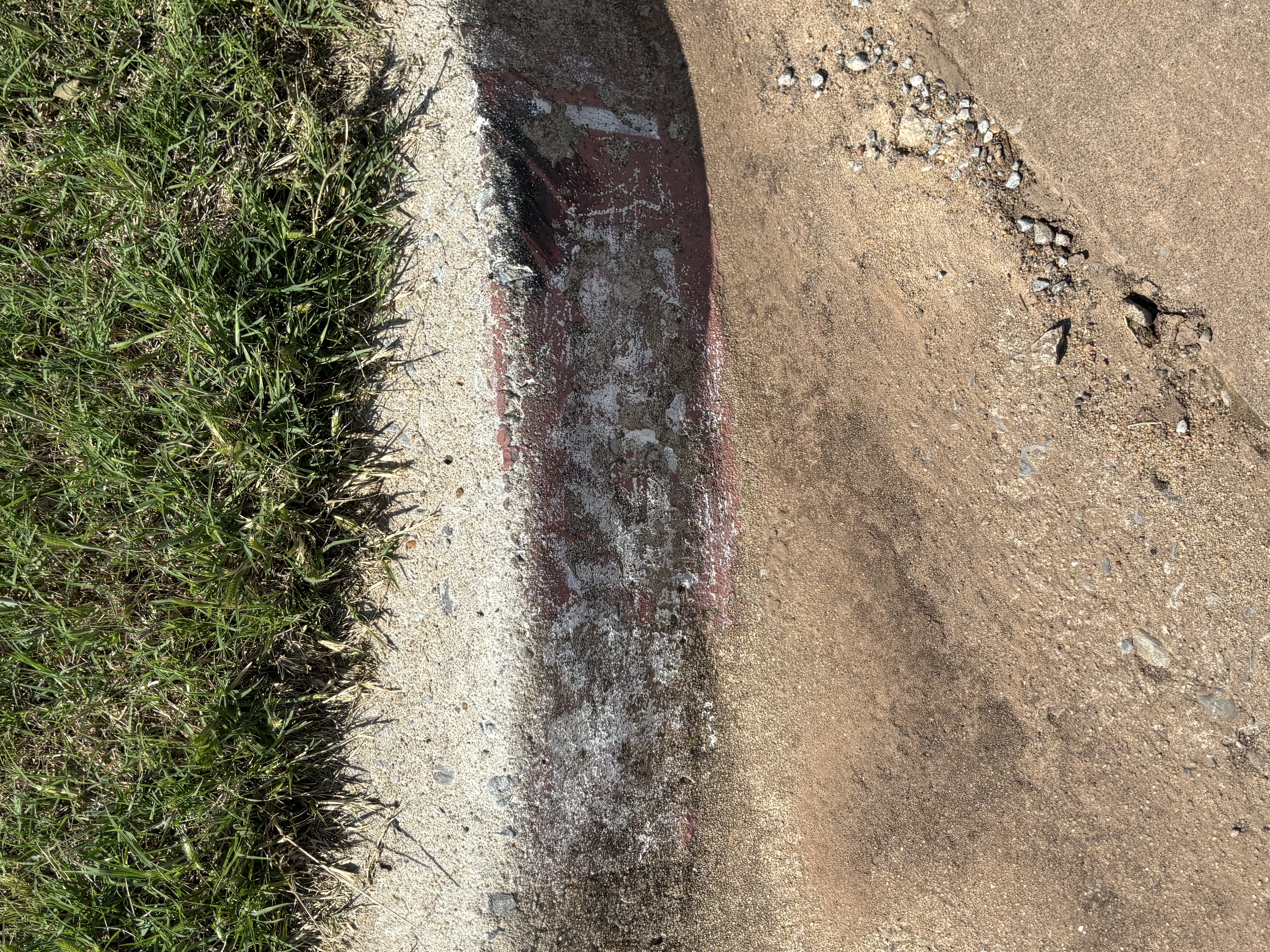 Faded curb before painting